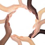 inter-racial hands in a circle