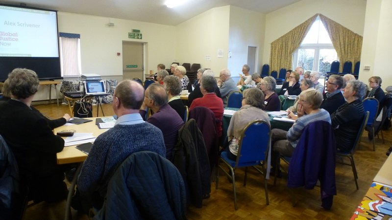 conference attendees listening to Alex Scrivener