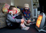 photo of children around an electric fire
