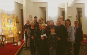 parishioners in Cottingley around the icon of peace