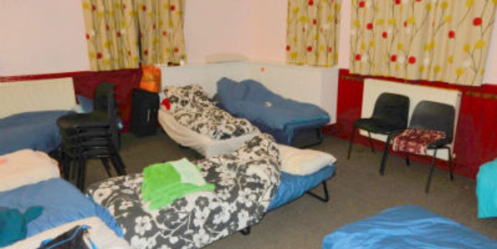 beds set up in church hall