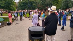 people gathered in park square Leeds