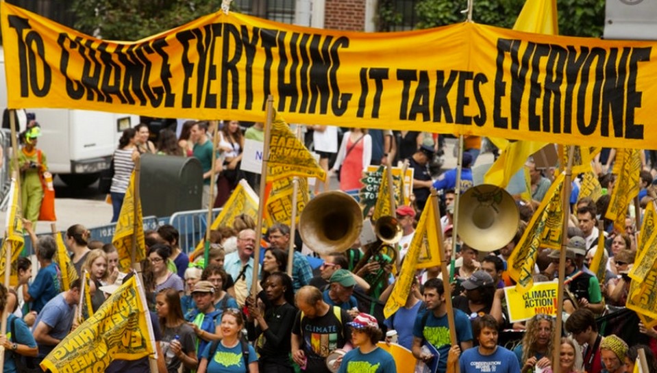 people at a climate change demonstration