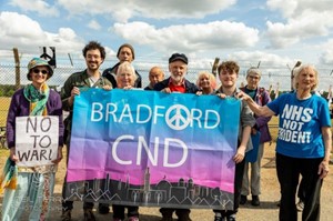 A group of people holding a CND banner