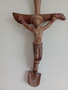The second picture is of a crucifix made by a craftsman in the north of Peru. If you look closely at it you will see that this ‘campesino Christ’ has a cross made up of a shovel and the crosspiece is a machete.